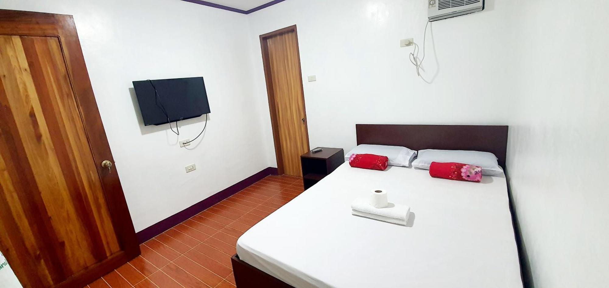 Sj Pabua Travellers Inn Мамбахао Экстерьер фото